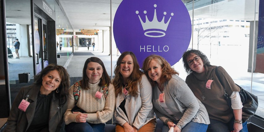 Some of the SJC Marketing team stops for a picture while touring Hallmark headquarters.