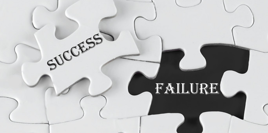 A white puzzle is nearly complete, with one piece missing that says "success." The blank spot in the puzzle says, "failure."