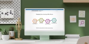 A desktop computer monitor shows an interactive map on a website.