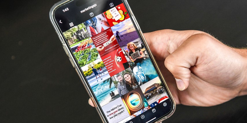 Close-up of a smartphone showing user-generated content and authentic images.