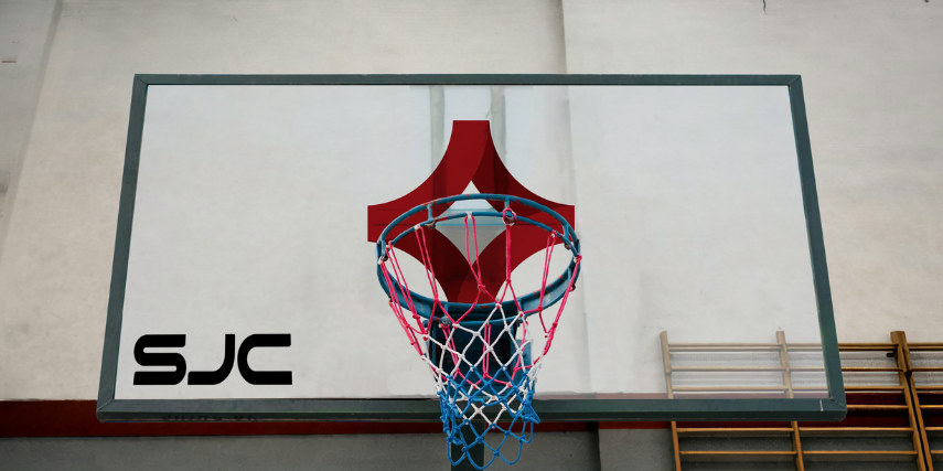 Image of a basketball hoop with SJC and the SJC logo on the backboard.