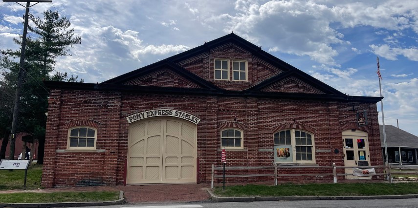 View from the street of the Pony Express Museum stable door and entrance.