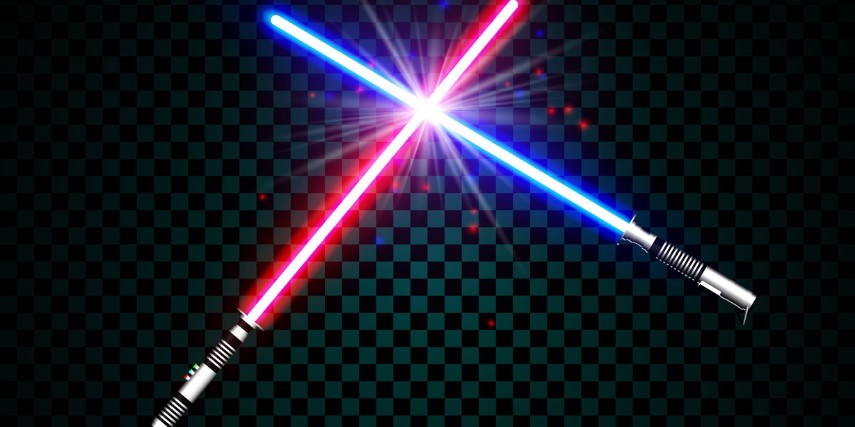 Two Star Wars lightsabers cross against a black background. 